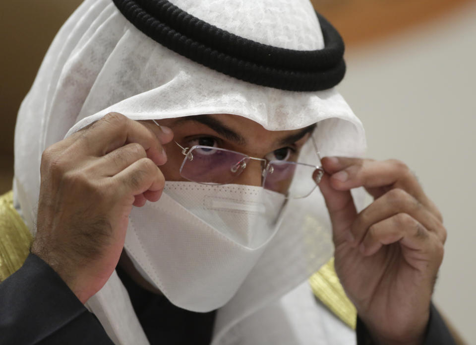 Secretary General of the Gulf Cooperation Council (GCC) Nayef Falah Al-Hajraf, wears a face mask to help curb the spread of the coronavirus as he speaks at a press conference during the 41st Gulf Cooperation Council (GCC) meeting being held in Al Ula, Saudi Arabia, Tuesday, Jan. 5, 2021. (AP Photo/Amr Nabil)