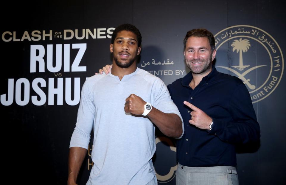 Anthony Joshua, left, is promoted by Eddie Hearn (Nick Potts/PA) (PA Archive)