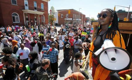 Debbie Owusu-Akyeeah leads a protest march in Ottawa, Ontario, Canada July 30, 2016 for Abdirahman Abdi, a mentally ill black man who died following his arrest by police. REUTERS/Patrick Doyle