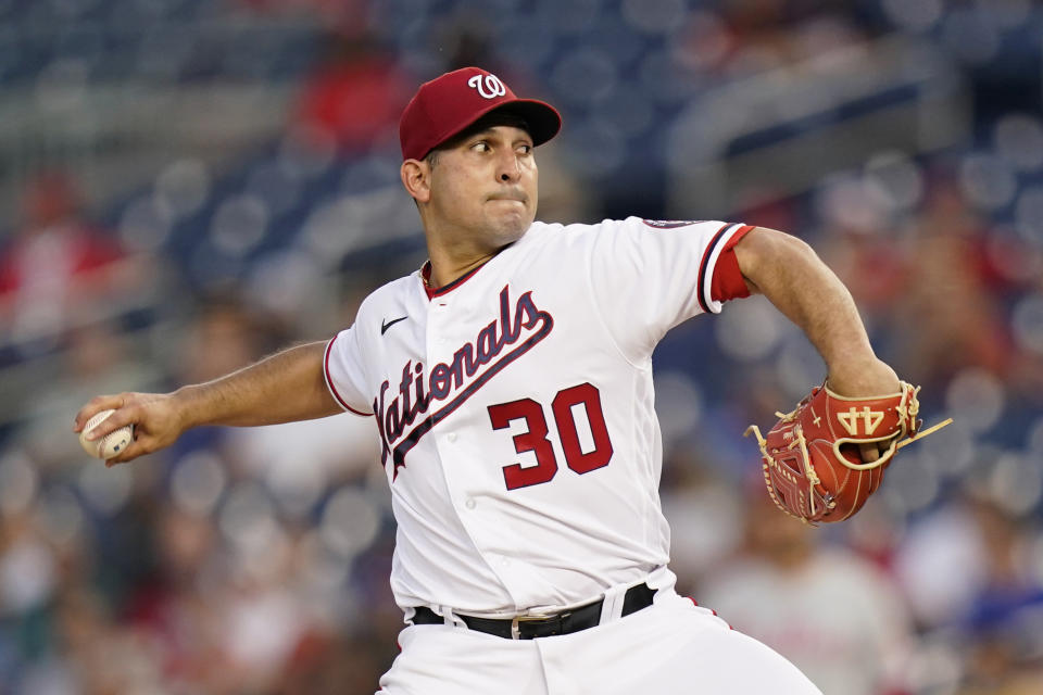 Washington Nationals starting pitcher Paolo Espino throws to the Philadelphia Phillies in the fourth inning of a baseball game, Wednesday, Aug. 4, 2021, in Washington. (AP Photo/Patrick Semansky)