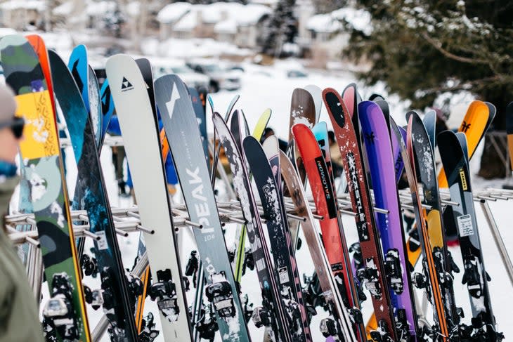 Test skis propped up on rack