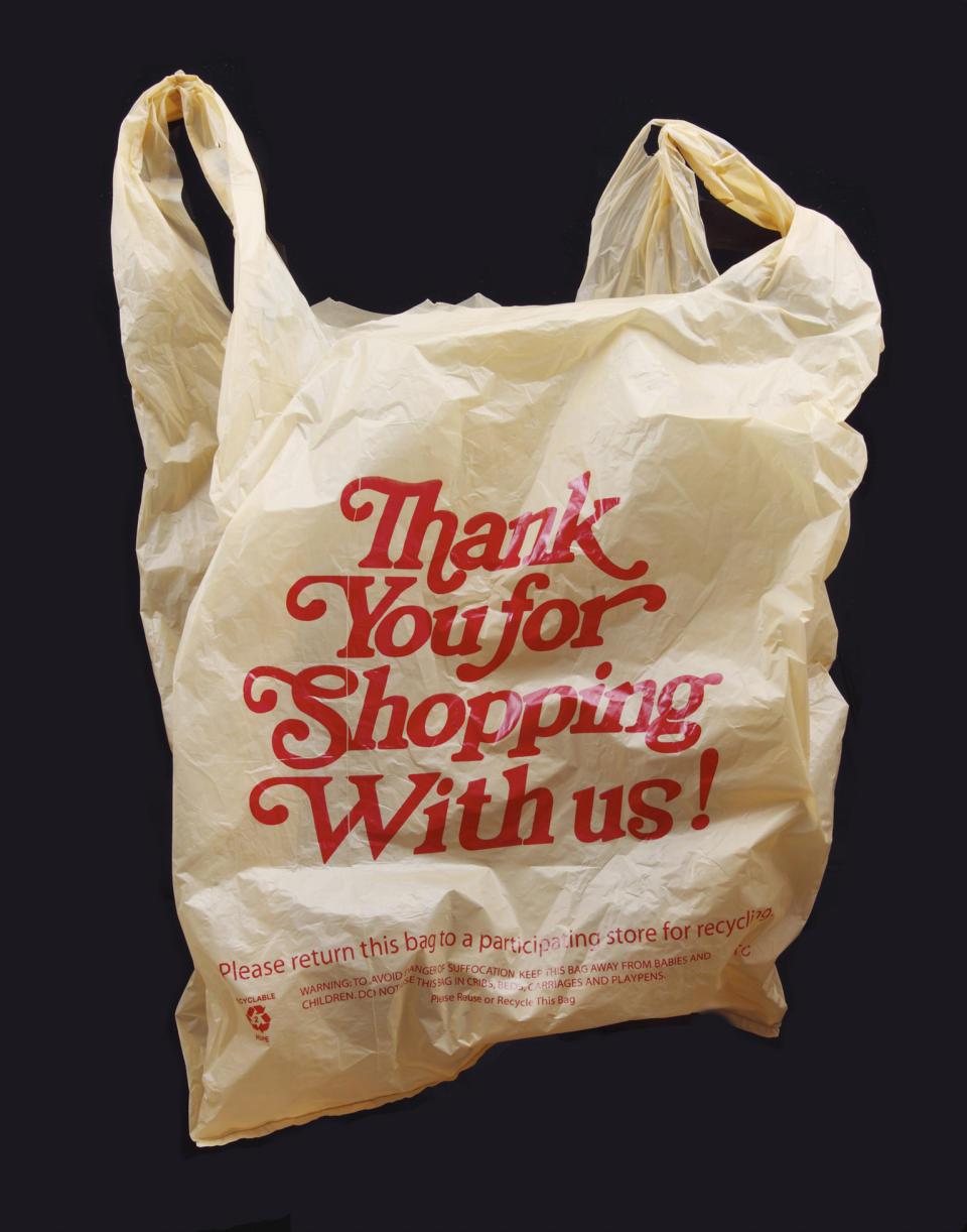 A plastic "Thank you for shopping with us" shopping bag