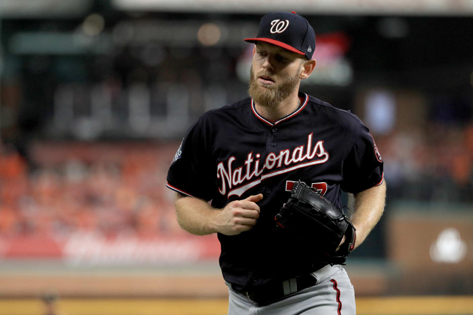 Stephen Strasburg is re-signing with the Nationals, the only team he's ever known. (Mike Ehrmann/Getty Images)