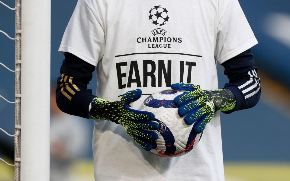 Leeds United players wear protest T-shirts ahead of the match against Liverpool at Elland Road - Getty