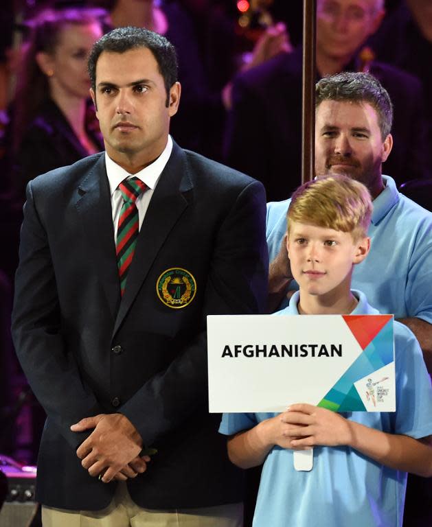 Afghanistan's captain Mohammad Nabi (L), seen during the opening ceremony of the 2015 Cricket World Cup, at the Myer Music Bowl in Melbourne, on February 12