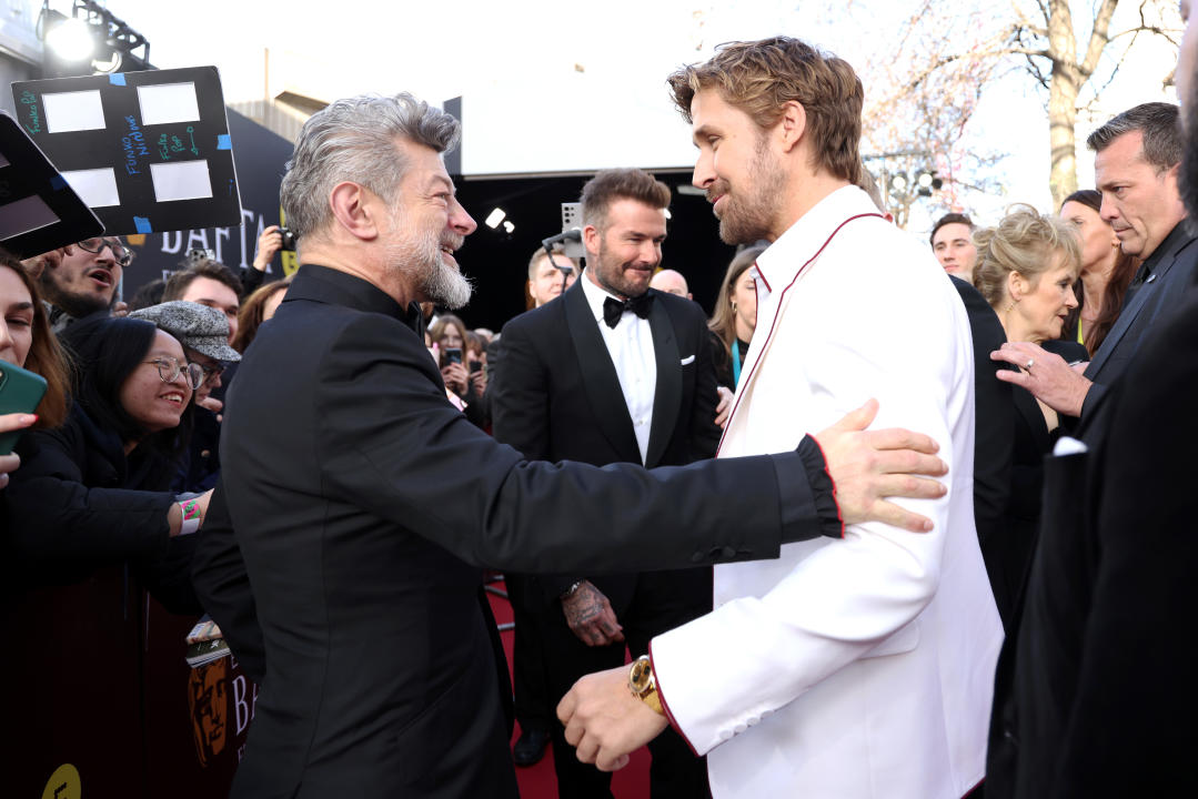 LONDON, ENGLAND - FEBRUARY 18: Andy Serkis greets Ryan Gosling during the EE BAFTA Film Awards 2024 at The Royal Festival Hall on February 18, 2024 in London, England. (Photo by Tristan Fewings/BAFTA/Getty Images for BAFTA)