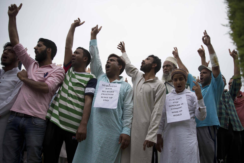Kashmiri Muslims shout pro-freedom slogans during a demonstration after Friday prayers amid curfew like restrictions in Srinagar, India, Friday, Aug. 16, 2019. Hundreds of people have held a street protest in Indian-controlled Kashmir as India's government assured the Supreme Court that the situation in the disputed region is being reviewed daily and unprecedented security restrictions will be removed over the next few days. (AP Photo/Dar Yasin)