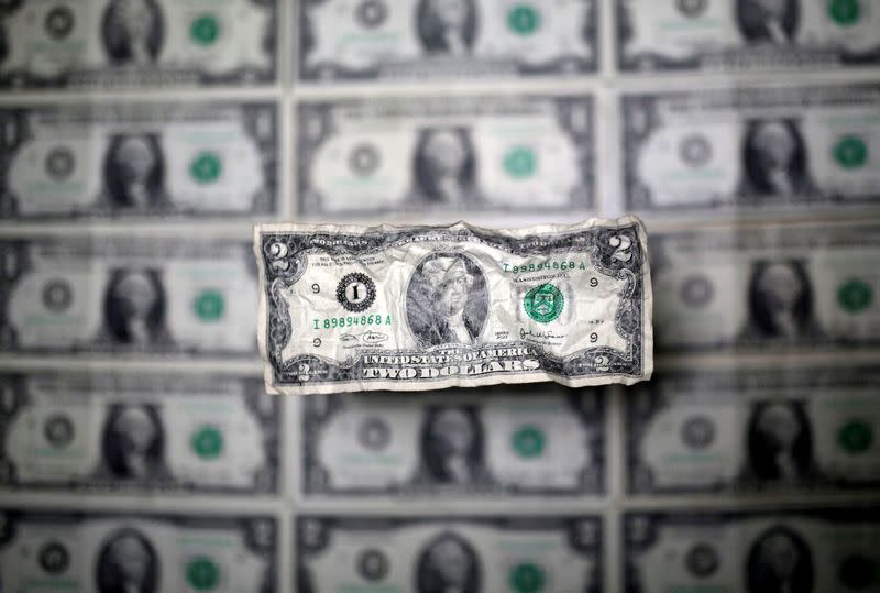 FILE PHOTO: U.S. dollar banknote is seen in this picture illustration