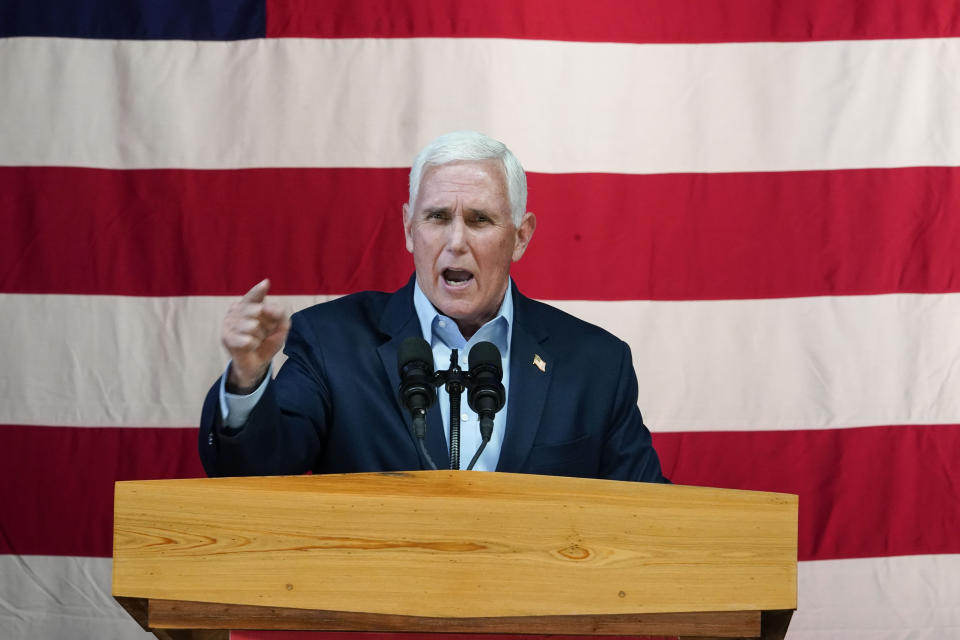 Former Vice President Mike Pence speaks on behalf of Georgia Gov. Brian Kemp during a rally, Monday, May 23, 2022, in Kennesaw, Ga. Pence is opposing former President Donald Trump and his preferred Republican candidate for Georgia governor, former U.S. Sen. David Perdue. (AP Photo/Brynn Anderson)