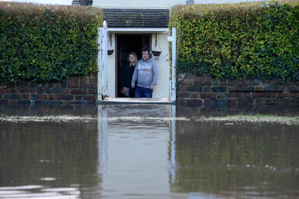 The water is about knee-deep. (SWNS)