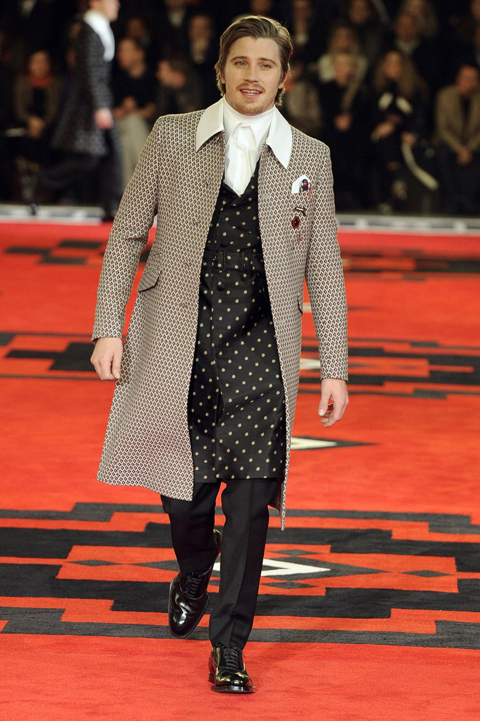 Prada villains fashion show runway, MILAN, ITALY - JANUARY 15: Actor Garrett Hedlund walks the runway at the Prada Fall Winter 2012 fashion show during Milan Menswear Fashion Week on January 15, 2012 in Milan, Italy.  (Photo: Chris Moore/Catwalking/Getty Images)