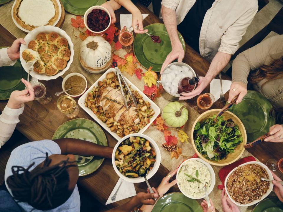 friends celebrating thanksgiving dinner together