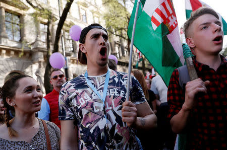 People attend a protest against the government of Prime Minister Viktor Orban in Budapest, Hungary, April 14, 2018. REUTERS/Bernadett Szabo