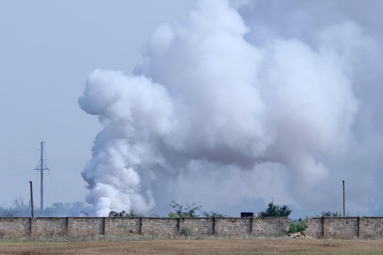 Image: Explosions at temporary ammunition depot in noorthen Crimea (Sergei Malgavko / Zuma Press)