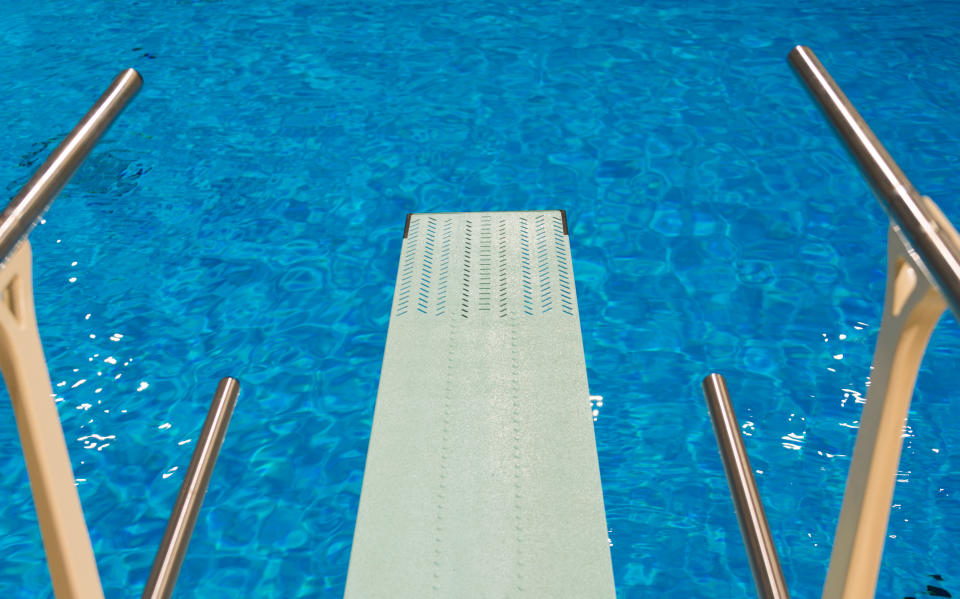 CANADIAN SPORT INSTITUTE ONTARIO, TORONTO, ONTARIO, CANADA - 2015/03/23: View from an Olympic sport diving board at an  indoor swimming pool with clear transparent blue water. (Photo by Roberto Machado Noa/LightRocket via Getty Images)