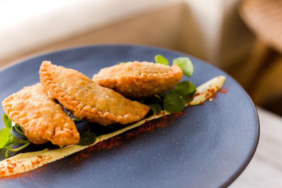 Braised-beef empanadas at Barrio bar at The Square, West Palm Beach.