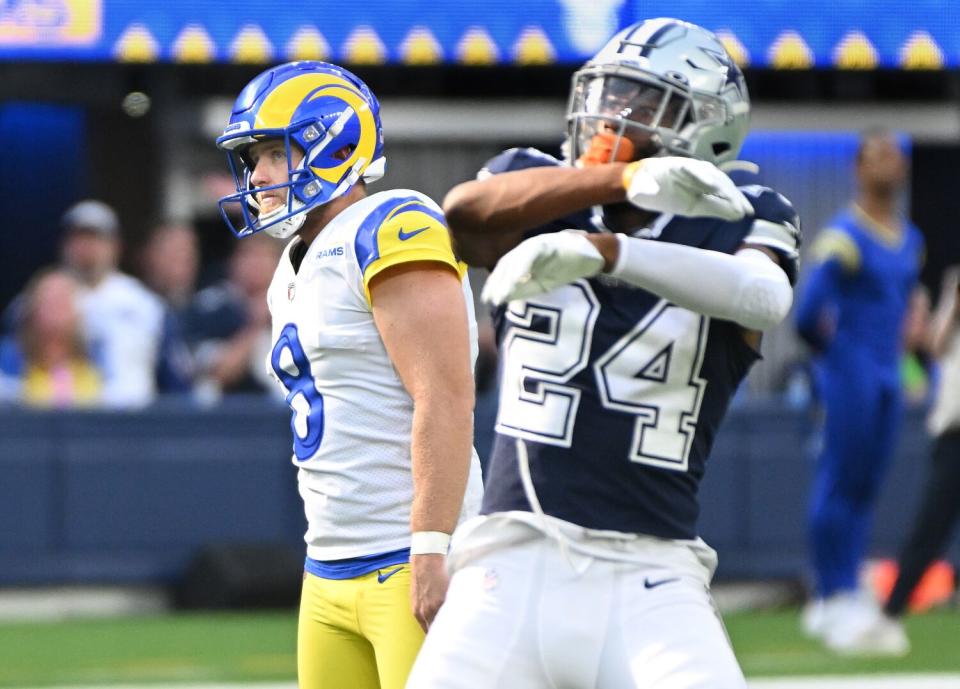 The Cowboys' Israel Mukuamu celebrates after the Rams' Matt Gay missed a field goal in the fourth quarter.