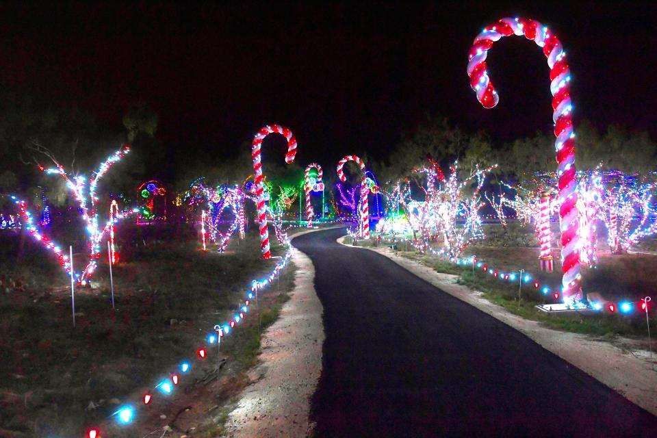 Electric candy canes line the now-asphalt path at United Way of Abilene's Winter Lightfest, which is open again this weekend.