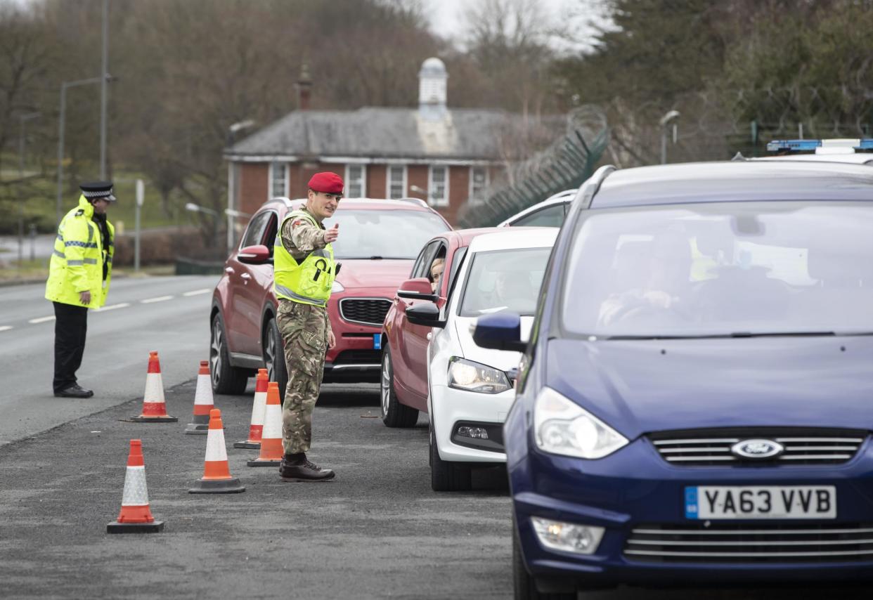 Royal Military Police 150 Provost Company, works alongside North Yorkshire Police, at a vehicle check point near Catterick Barracks: PA