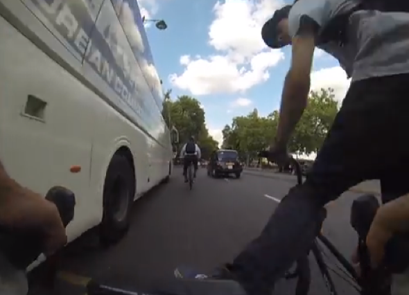 Cyclist kicked into path of bus by another man on bike