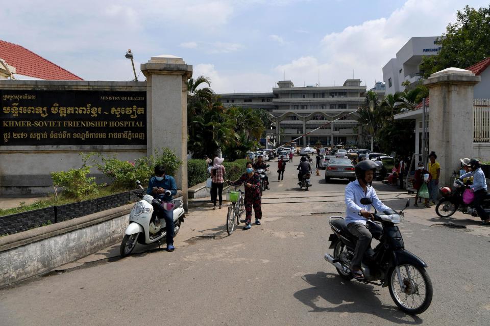 People outside the hospital where Duch died (Getty Images)