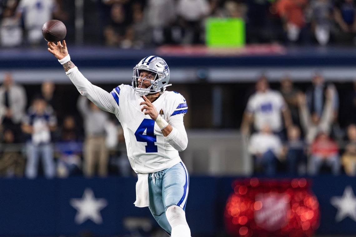 Cowboys quarterback Dan Prescott (4) throws a pass on the run in the third quarter of an NFL game between the Dallas Cowboys and the Seattle Seahawks at AT&T Stadium in Arlington on Thursday, Nov. 30, 2023. The Cowboys came out on top 41-35. Chris Torres/ctorres@star-telegram.com