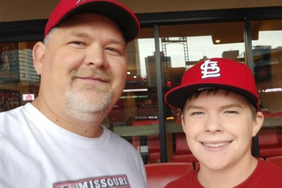 Dan Bryan lost his son Ethan to a car crash in September 2020 and found that playing catch with Strangers a sport loved by Ethan helped him in his mourning. in 2019 at a Cardinals game. Credit: Courtesy Dan Bryan