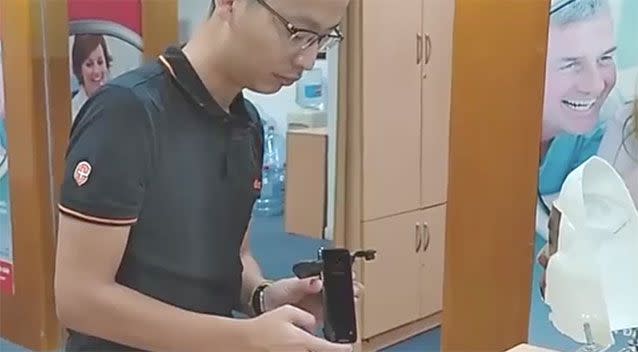 The researcher sets his iPhone X up facing the mask. Source: YouTube/ Bkav Corp