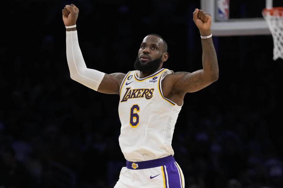 Los Angeles Lakers forward LeBron James (6) celebrates after scoring during the first half of an NBA basketball game against the Philadelphia 76ers in Los Angeles, Sunday, Jan. 15, 2023. (AP Photo/Ashley Landis)