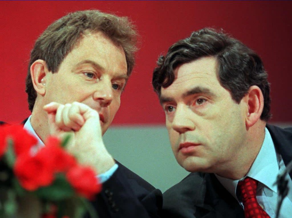 Tony Blair and Gordon Brown conferring at a press conference on 10 April, 1997 (AFP via Getty)