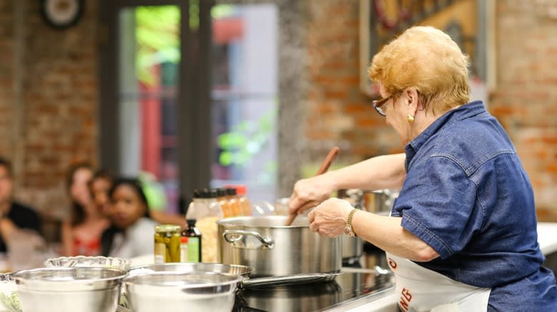 women cooking for audience