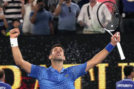 Novak Djokovic of Serbia celebrates after defeating Tommy Paul of the U.S. in their semifinal at the Australian Open tennis championship in Melbourne, Australia, Friday, Jan. 27, 2023. (AP Photo/Aaron Favila)