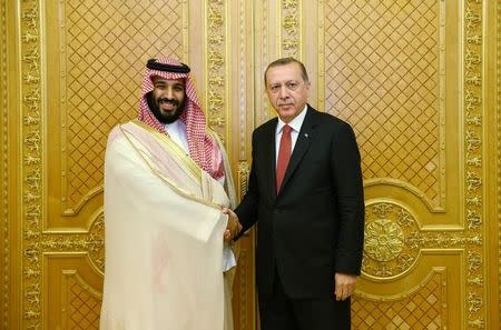 Turkish President Tayyip Erdogan meets with Saudi Arabia's Crown Prince Mohammed bin Salman in Jeddah, Saudi Arabia, July 23, 2017. Kayhan Ozer/Presidential Palace/Handout via REUTERS