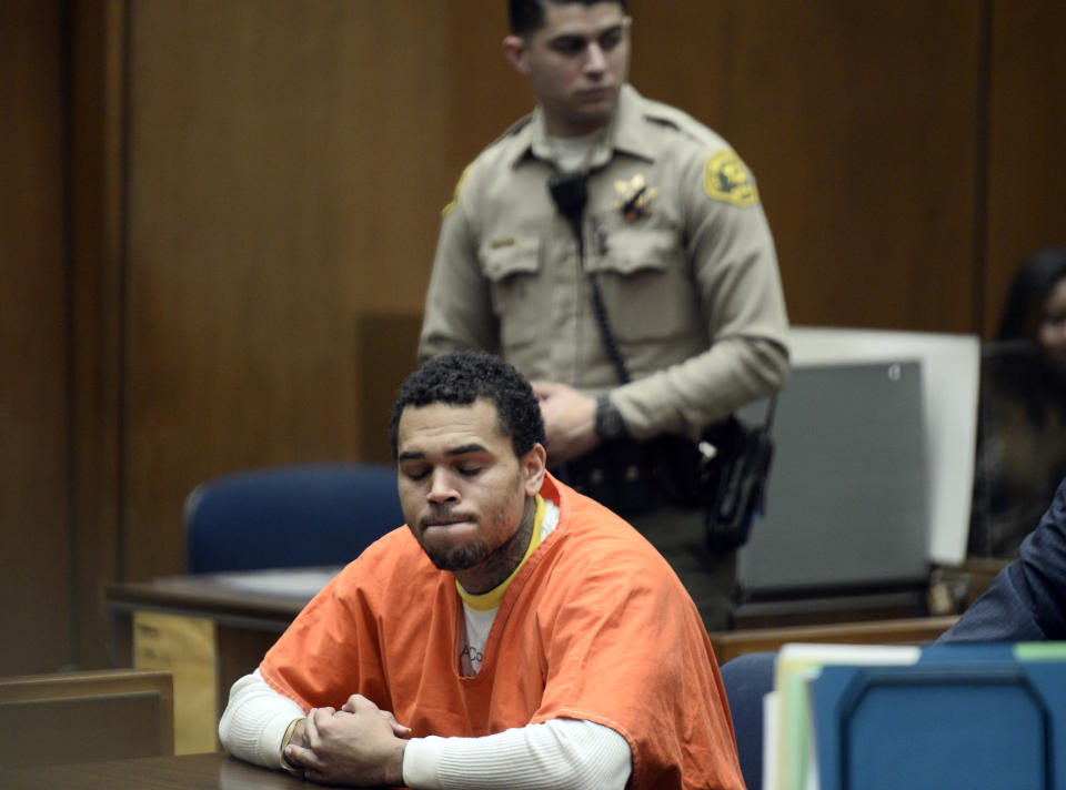 Chris Brown, appears in court Friday May 9, 2014 in Los Angeles. Brown on Friday admitted a probation violation over an altercation last year outside a hotel in Washington, D.C., and was sentenced to remain on probation and serve an additional 131 days in jail. (AP Photo/Paul Buck, POOL)