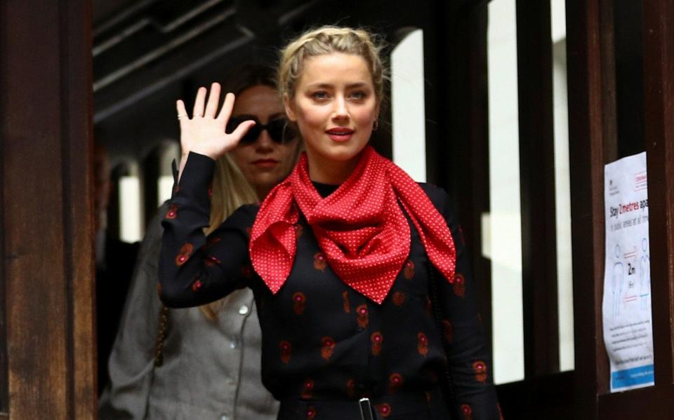 Amber Heard arrives at the High Court in London - HANNAH MCKAY /REUTERS