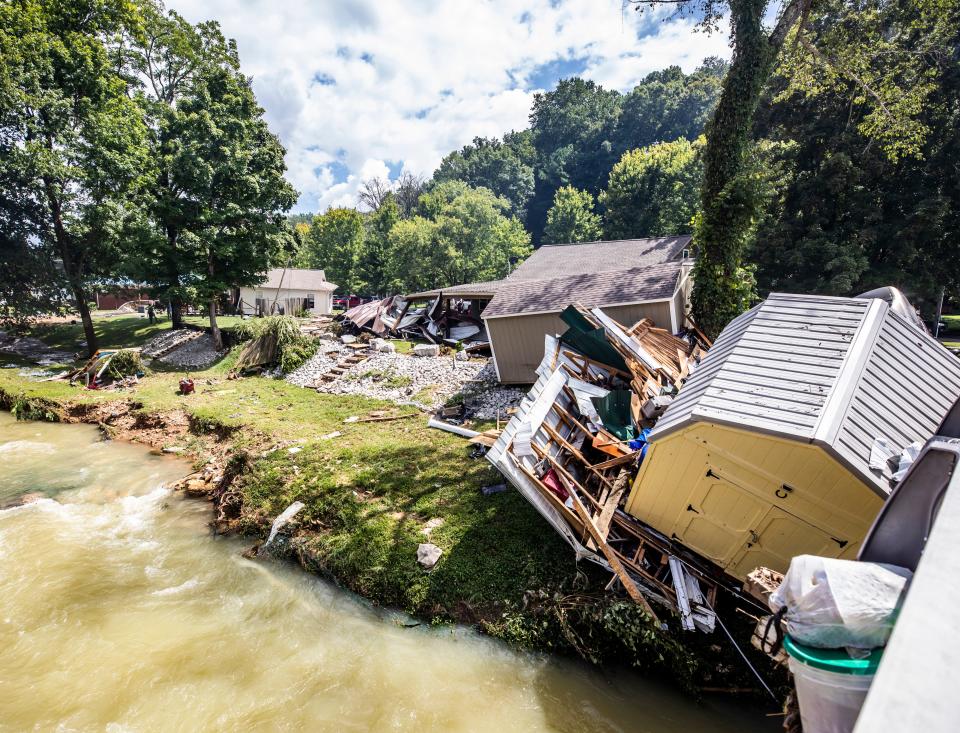 Flood damage along Trace Creek is photographed in Waverly Sunday, August 22, 2021.