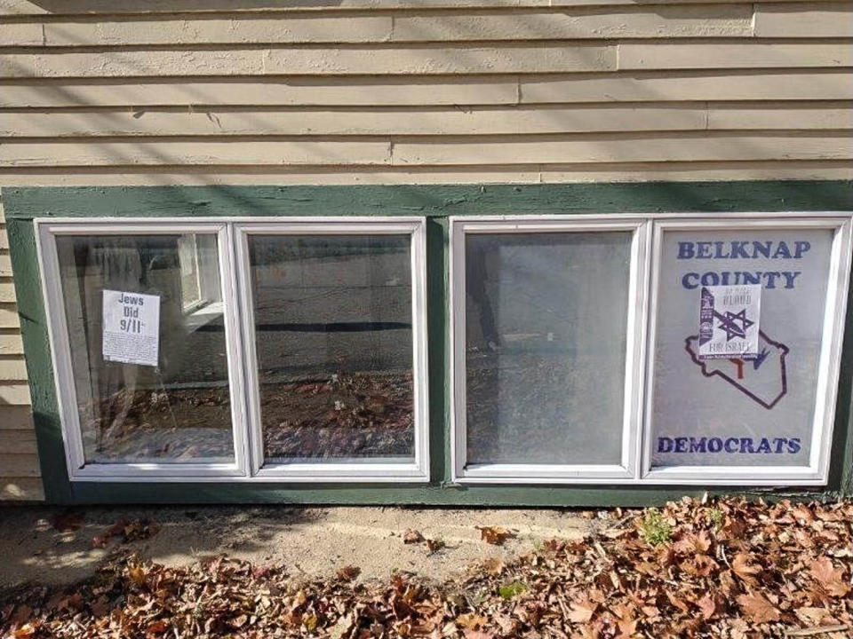 Posters are found on the outside of the Belknap County Democratic Party office showing a star of David with a knife through it and another accusing Jews of being behind the 9/11 terrorist attacks. (New Hampshire Democratic Party)