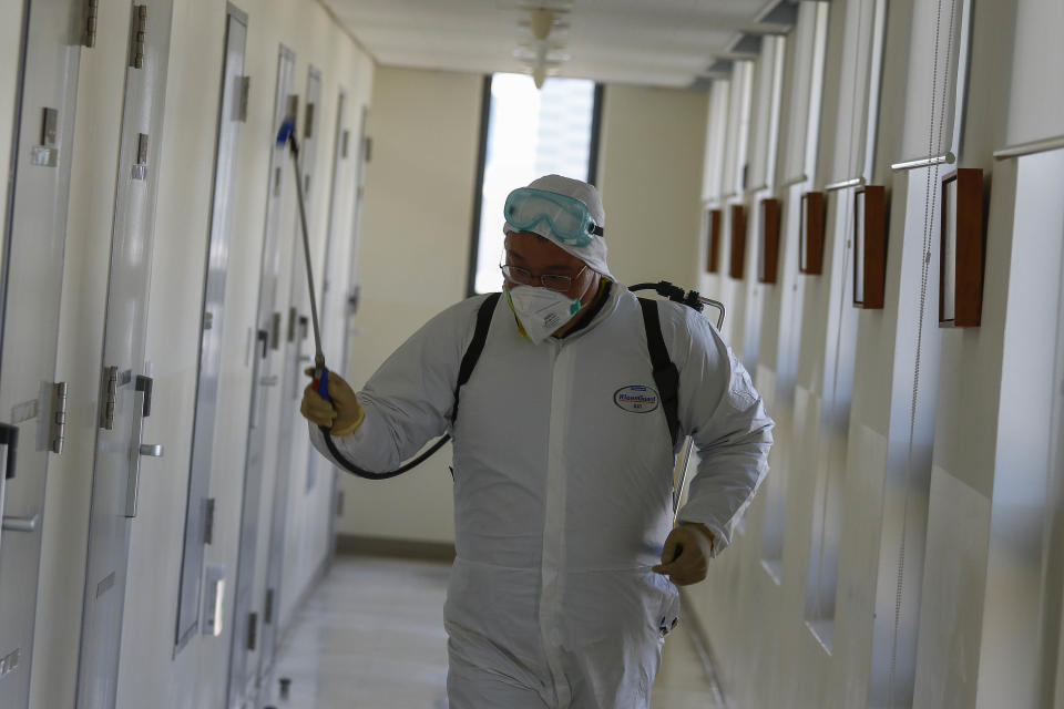 Local Government Officials and residents disinfect at the National Education Training Institute in the southeastern city of Daegu, South Korea, on March 2, 2020. South Korea reported 476 new cases of the coronavirus on Monday, bringing the total number of infections here to 4,212, as the nation provides an &quot;all-out response&quot; to the fast-spreading virus that includes a massive testing program.  (Photo by Seung-il Ryu/NurPhoto via Getty Images)