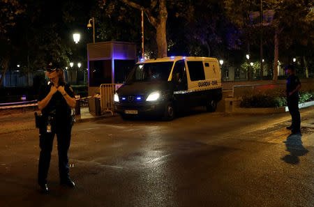 The Spanish Civil Guard van carrying Jordi Cuixart, leader of Omnium Cultural, and Jordi Sanchez of the Catalan National Assembly (ANC), leaves the High Court in Madrid, Spain, October 16, 2017. REUTERS/Susana Vera