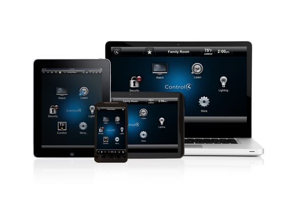 Control 4 software running on a laptop, a smartphone, and two tablets.