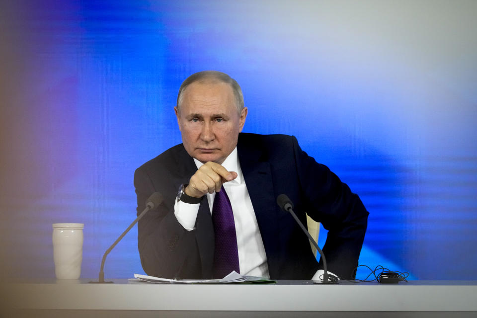 Russian President Vladimir Putin attends his annual news conference in Moscow, Russia, Thursday, Dec. 23, 2021. Putin has urged the West to 