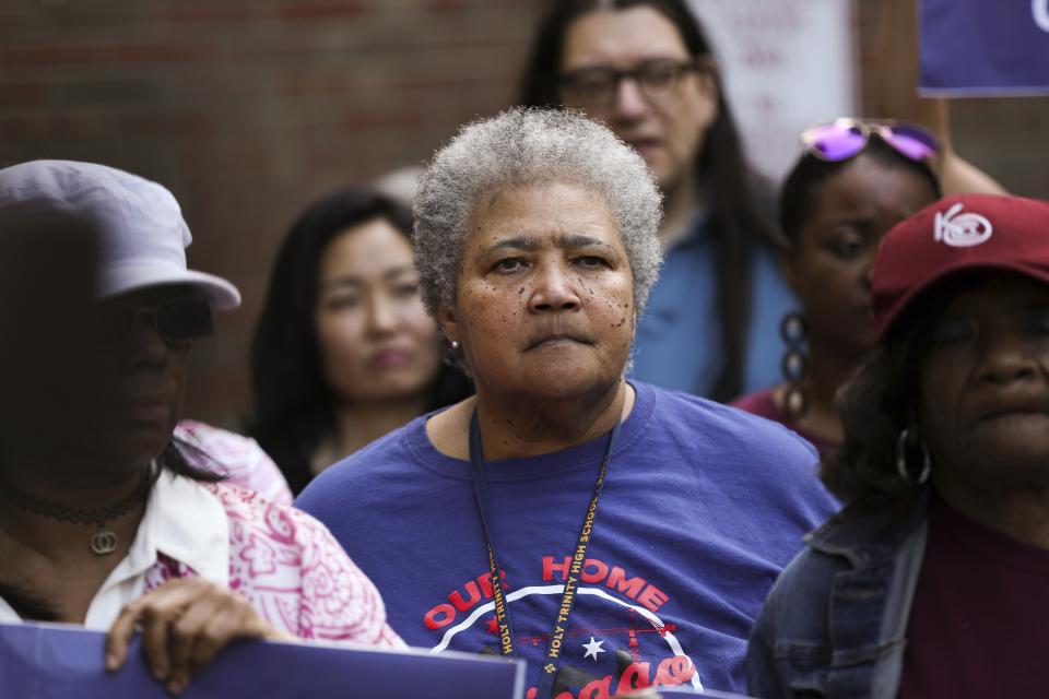 HOLD FOR STORY BY SOPHIA TAREEN - In this Tuesday, July 23, 2019 photo, president of Burenham Senior Tenant Association, Margaret Bewer, center, stands during a news conference and rally in Chicago. (AP Photo/Amr Alfiky)