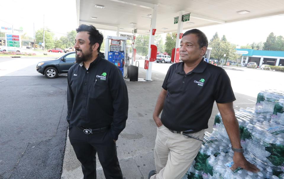 Managers Wali Malik, left, and Mohammed Sheikh, at the Chestnut Market convenience store in Nanuet Sept. 8, 2023.