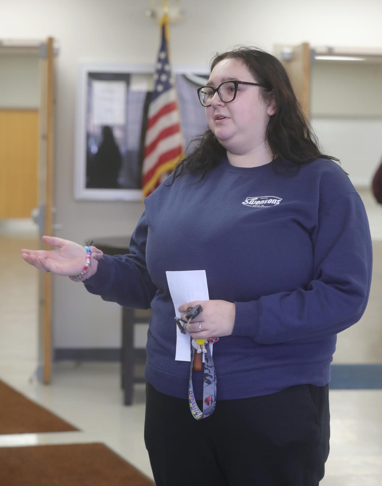 Emma Douglas-Wolfe talks about her views on Issues 1 and 2 after casting her vote at the Tallmadge Community Center on Tuesday, Nov. 7, 2023, in Tallmadge, Ohio. [Phil Masturzo/ Beacon Journal]