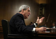 <p>Federal Bureau of Investigation (FBI) Director Robert Mueller testifies during a hearing before the Senate Judiciary Committee June 19, 2013 on Capitol Hill in Washington. Mueller confirmed that the FBI uses drones for domestic surveillance during the hearing on FBI oversight. (Photo: Alex Wong/Getty Images) </p>