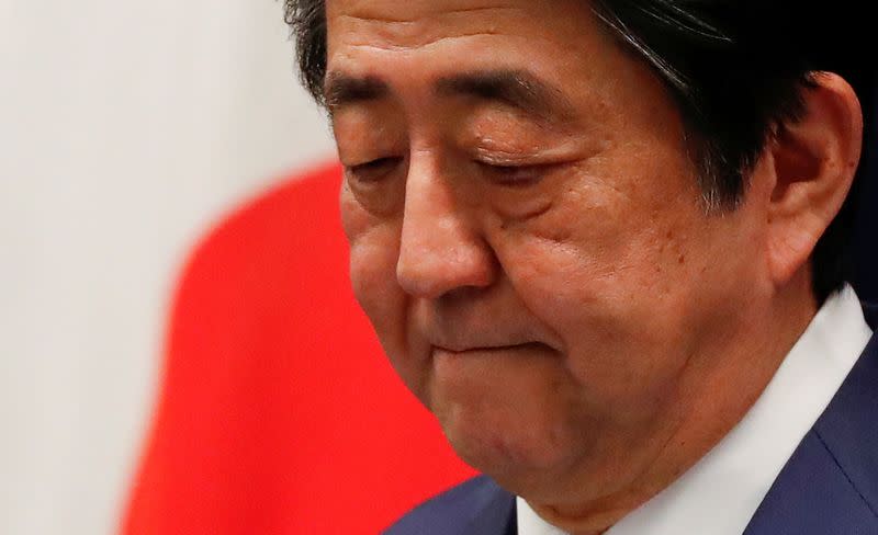 FILE PHOTO : Japan's Prime Minister Shinzo Abe attends a news conference on Japan's response to the coronavirus outbreak at his official residence in Tokyo