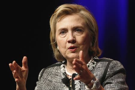 Former U.S. Secretary of State Hillary Clinton reacts to a question as she discusses her new book "Hard Choices: A Memoir" at George Washington University in Washington June 13, 2014. REUTERS/Jonathan Ernst