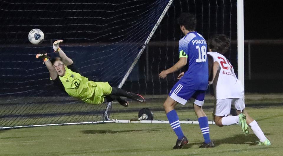 Matanzas High's goalie Ben Kopach bolcks a Seabreeze High shot, Thursday January 6, 2022.