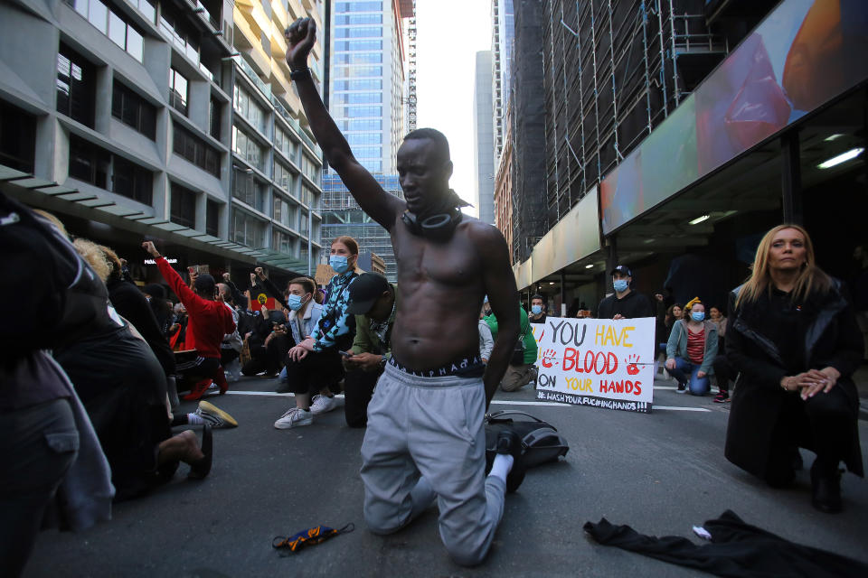 SYDNEY, AUSTRALIA - JUNE 6: Protesters participate in a protest in Sydney to show solidarity with Black Lives Matter demonstrations in the US, which were sparked by the death of George Floyd and rally to stop Aboriginal deaths in custody after an appeal court's last-minute decision to authorise the public gathering in Australia on June 6, 2020. (Photo by Steven Saphore/Anadolu Agency via Getty Images)