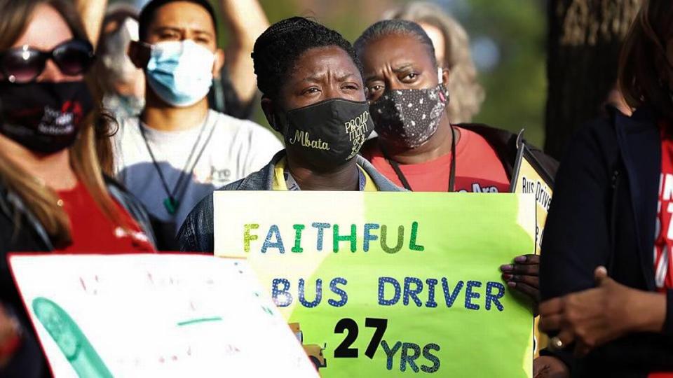 Ernestine Mbata, a Wake County school bus driver for the past 27 years, was one of many who attended a rally calling on the Wake County school board to increase pay and improve work conditions for many employees of the school system, Tuesday, Nov. 2, 2021.